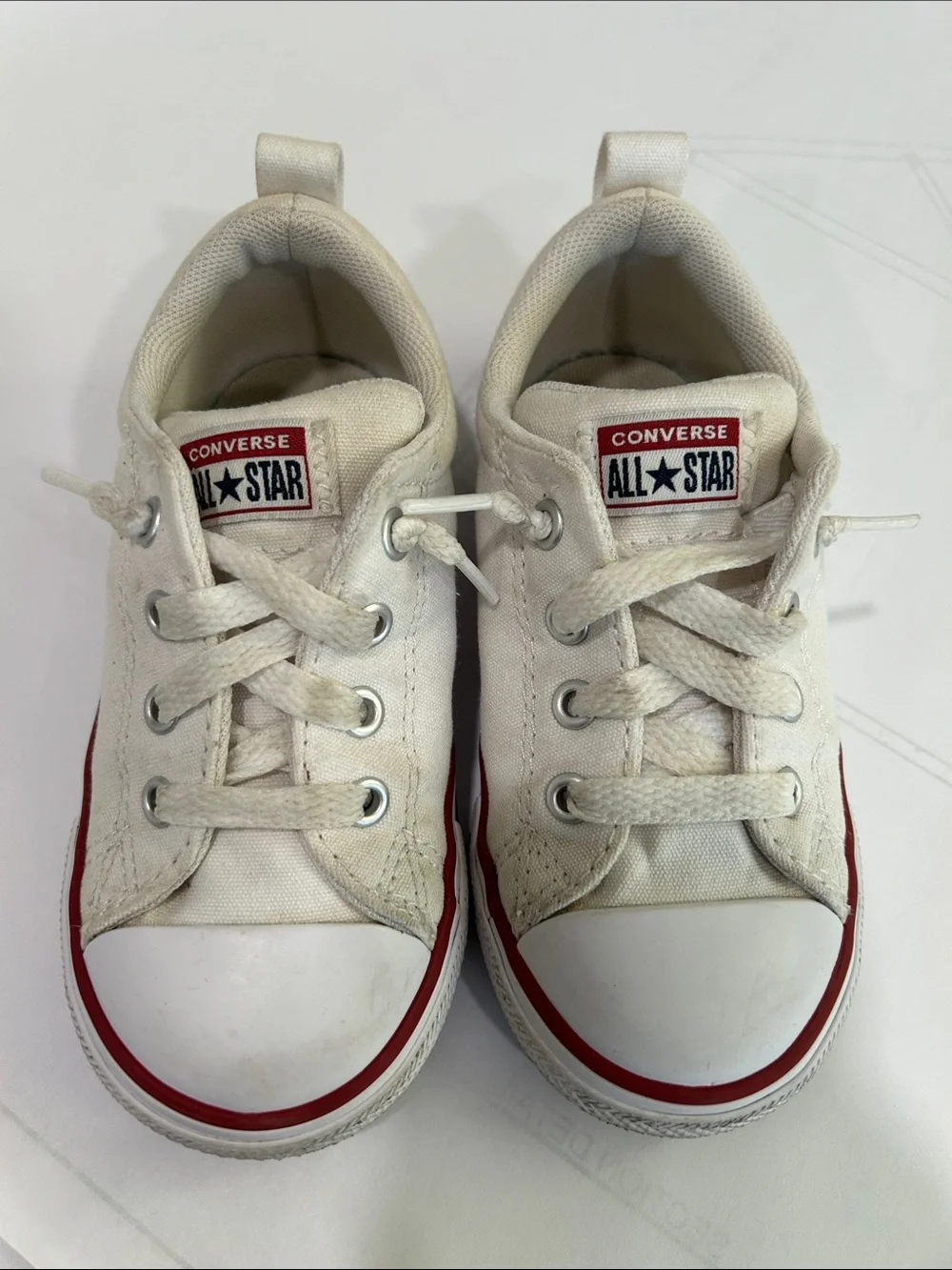 Converse Kids Low Top Canvas Sneakers in White and Red Trim
